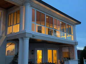 Impact Glass Sunroom with Lower Transoms in White.